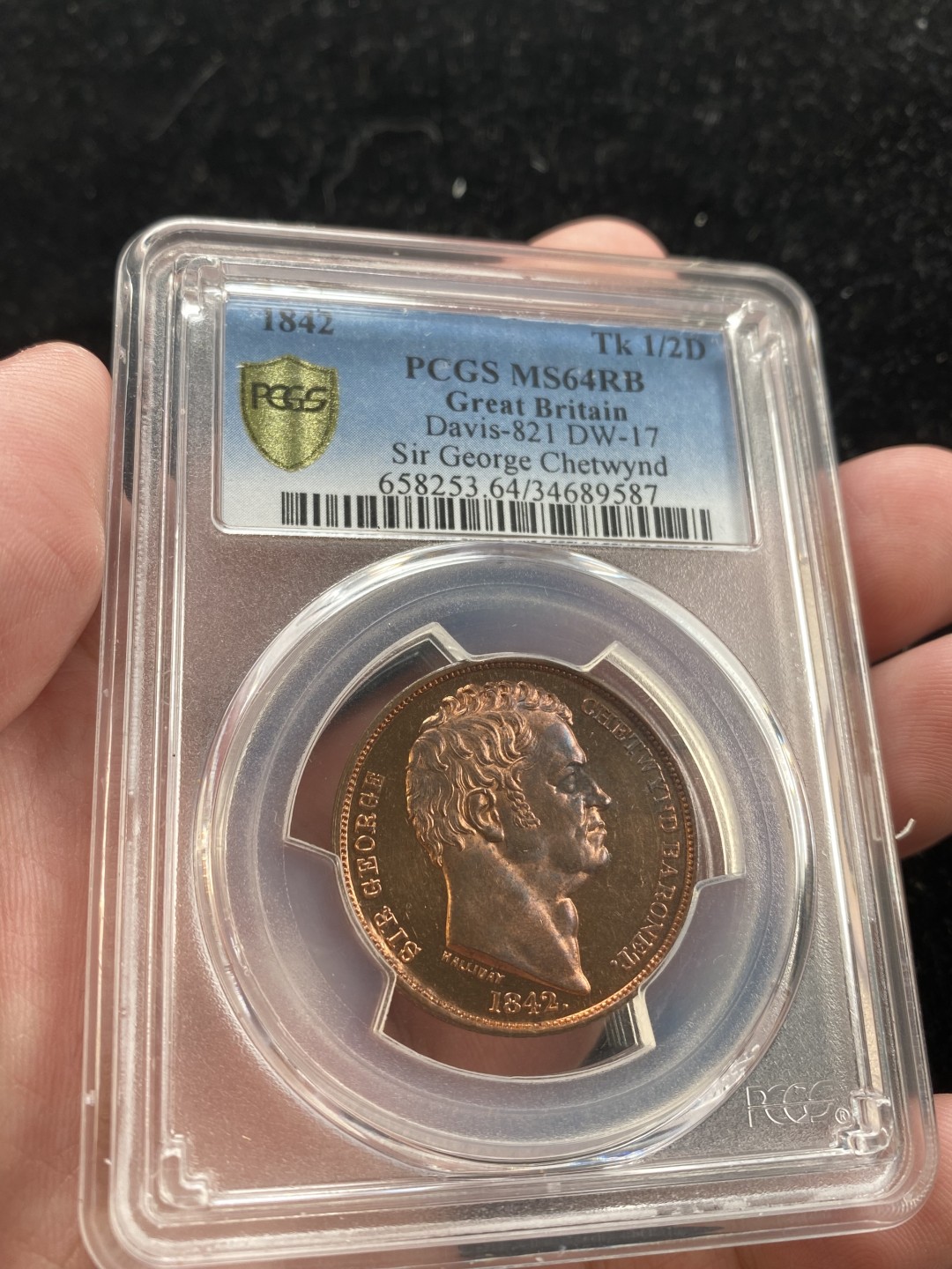 万国钱币拍卖第007期（慕尼黑第二夜） PCGS-MS64RB 英国1842年乔治爵士半便士代币，P记唯一冠军，双面PL效果明显，浮雕细节完美。