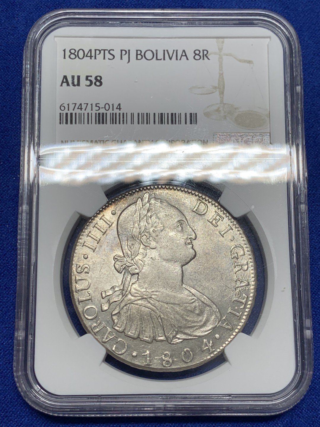 欢迎参加《竞宝斋》五一特拍-第161场-周日，周一 2场 NGC-AU58 西属玻利维亚 1804年卡四8R银币,高点俱全，底板几近无痕，铸纹还在，严重低评的一颗卡四