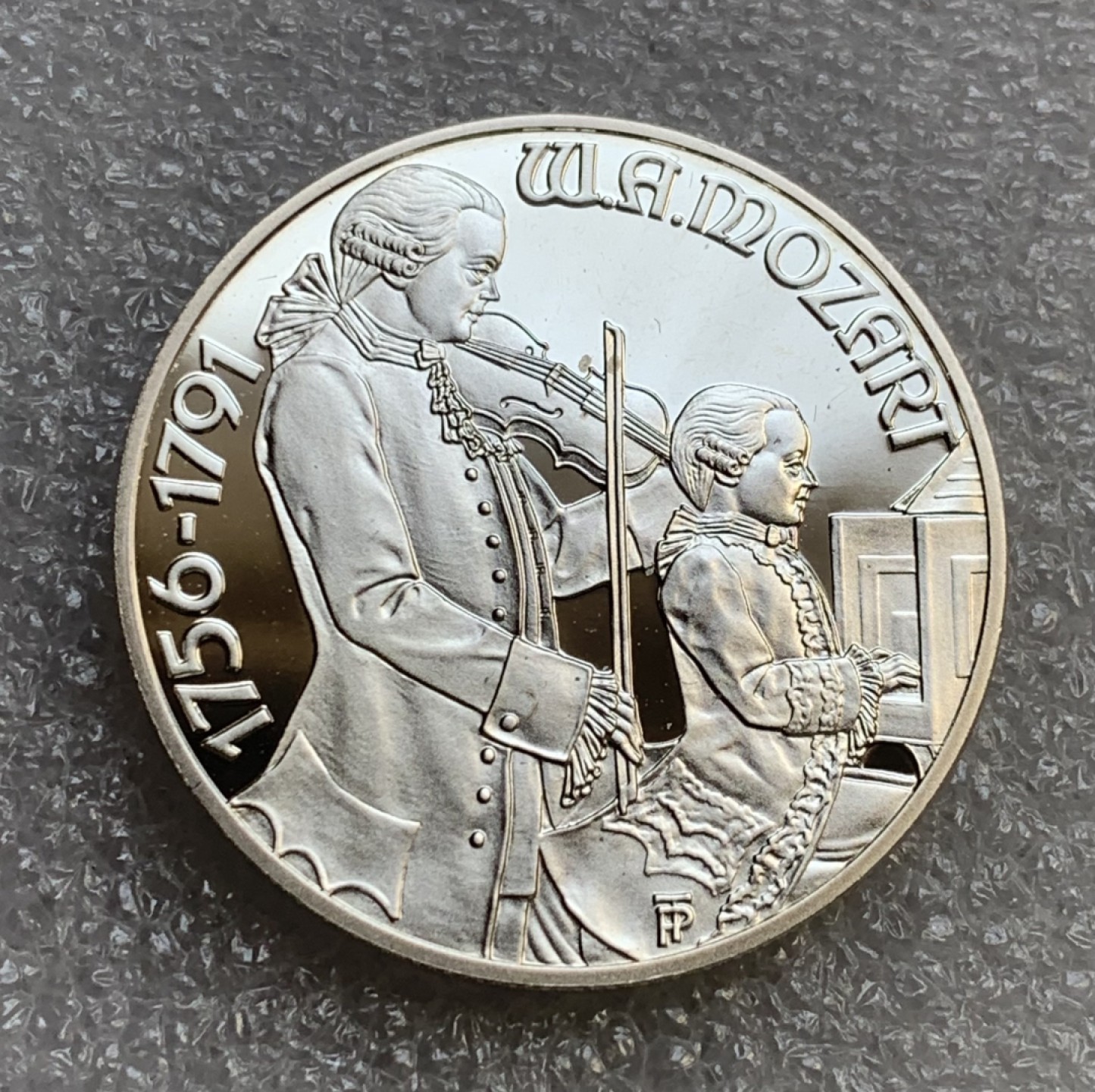 瓶子🏺第89期拍卖会 1991年奥地利100先令精制纪念银币  莫扎特