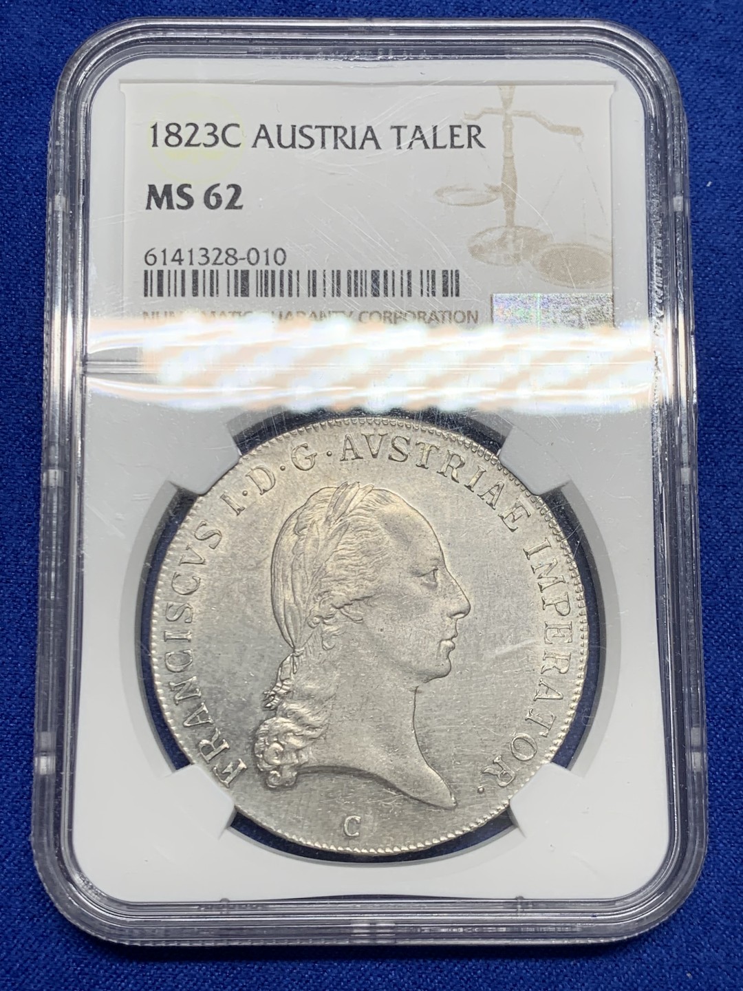 欢迎参加《竞宝斋》五一特拍-第161场-周日，周一 2场 NGC-MS62 奥地利帝国 1823-C 弗朗茨一世泰勒 N/P唯一冠军分 鹰面浮雕细腻 底板完好 收藏级高分