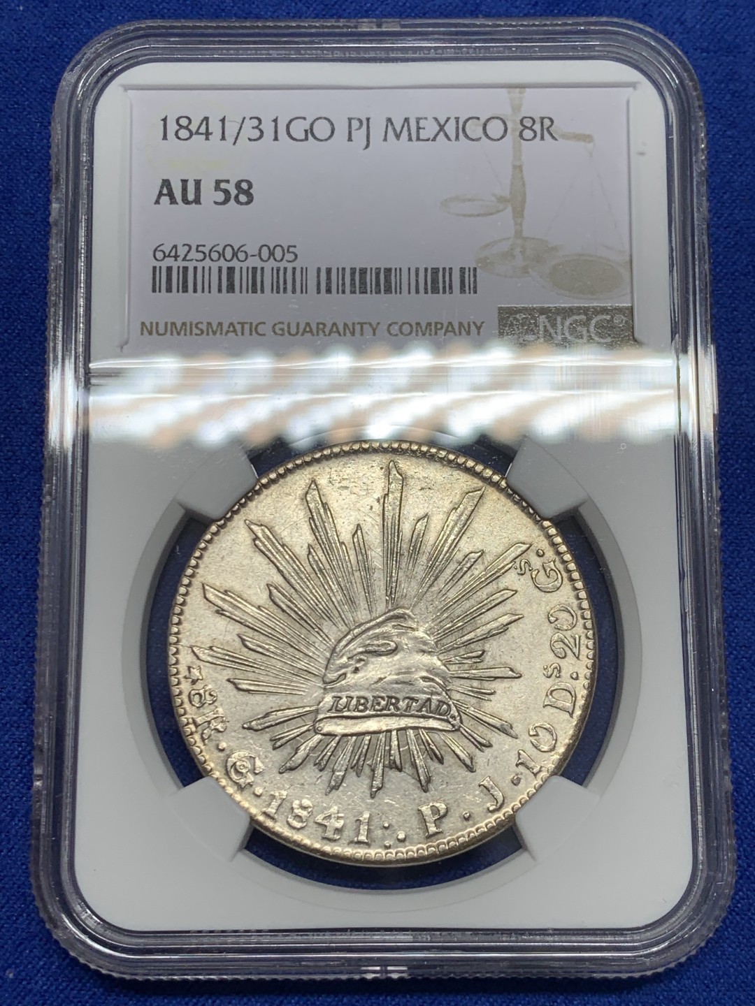 欢迎参加《竞宝斋》五一特拍-第161场-周日，周一 2场 NGC-AU58 墨西哥1841/31年早期骑字版鹰洋 少见骑字版 鹰面透打