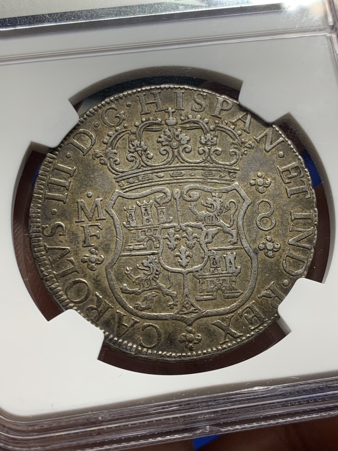 欢迎参加《竞宝斋》五一特拍-第161场-周日，周一 2场 NGC AU55 墨西哥 1767 地球双柱大银币 油腻的浓郁五彩包浆 西属看状态 不可多得