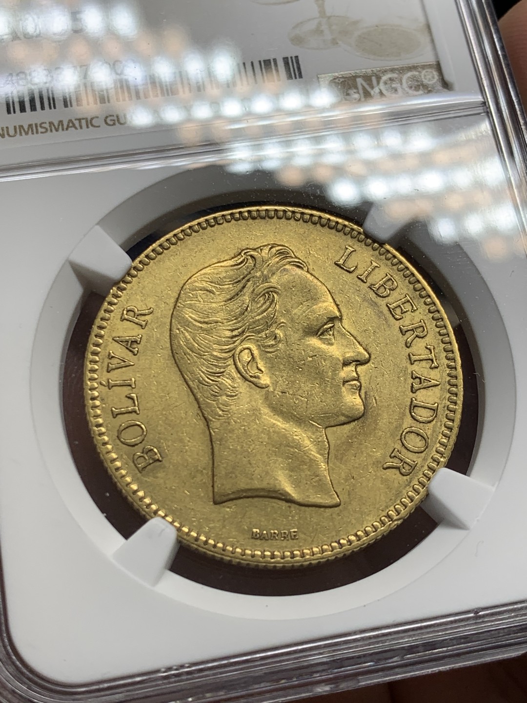 欢迎参加《竞宝斋》五一特拍-第161场-周日，周一 2场 NGC-AU55 委内瑞拉1889年 100玻利瓦尔大金币 南美系暴涨 有分的委内瑞拉大金币不多