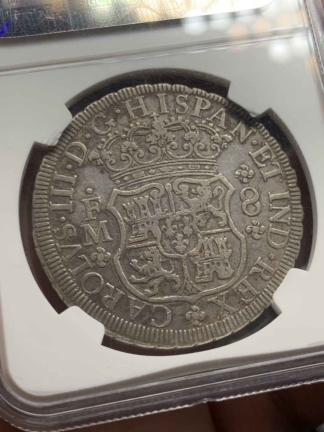 欢迎参加《竞宝斋》五一特拍-第161场-周日，周一 2场 NGC XF40 1771MO FM 墨西哥 双柱地球8里亚尔银币，低评