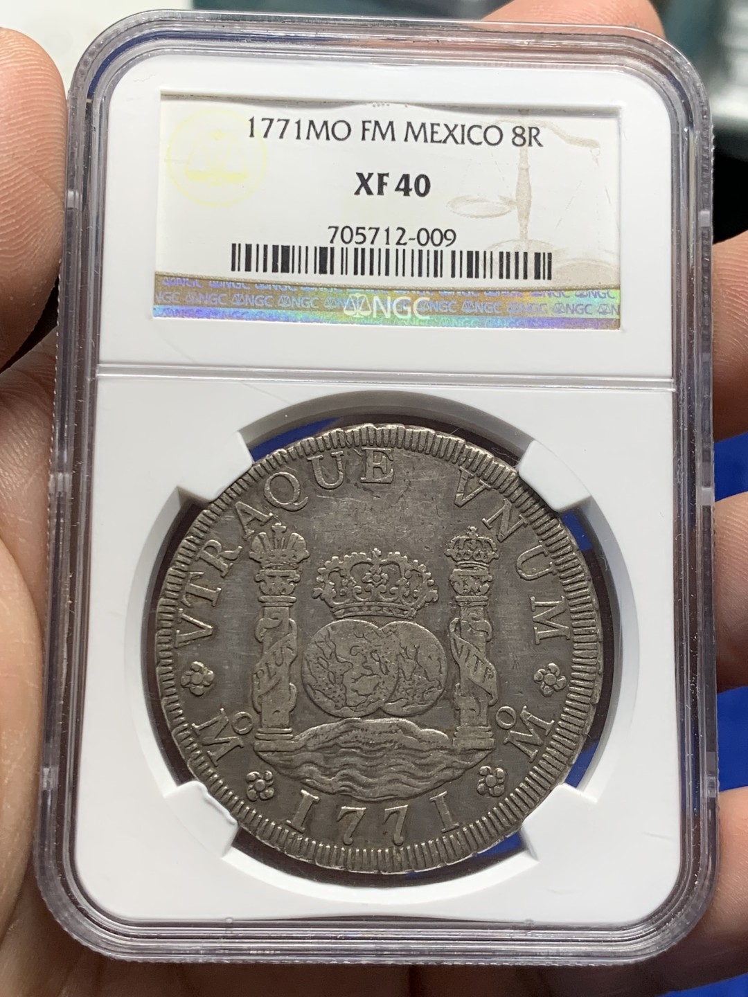 欢迎参加《竞宝斋》五一特拍-第161场-周日，周一 2场 NGC XF40 1771MO FM 墨西哥 双柱地球8里亚尔银币，低评