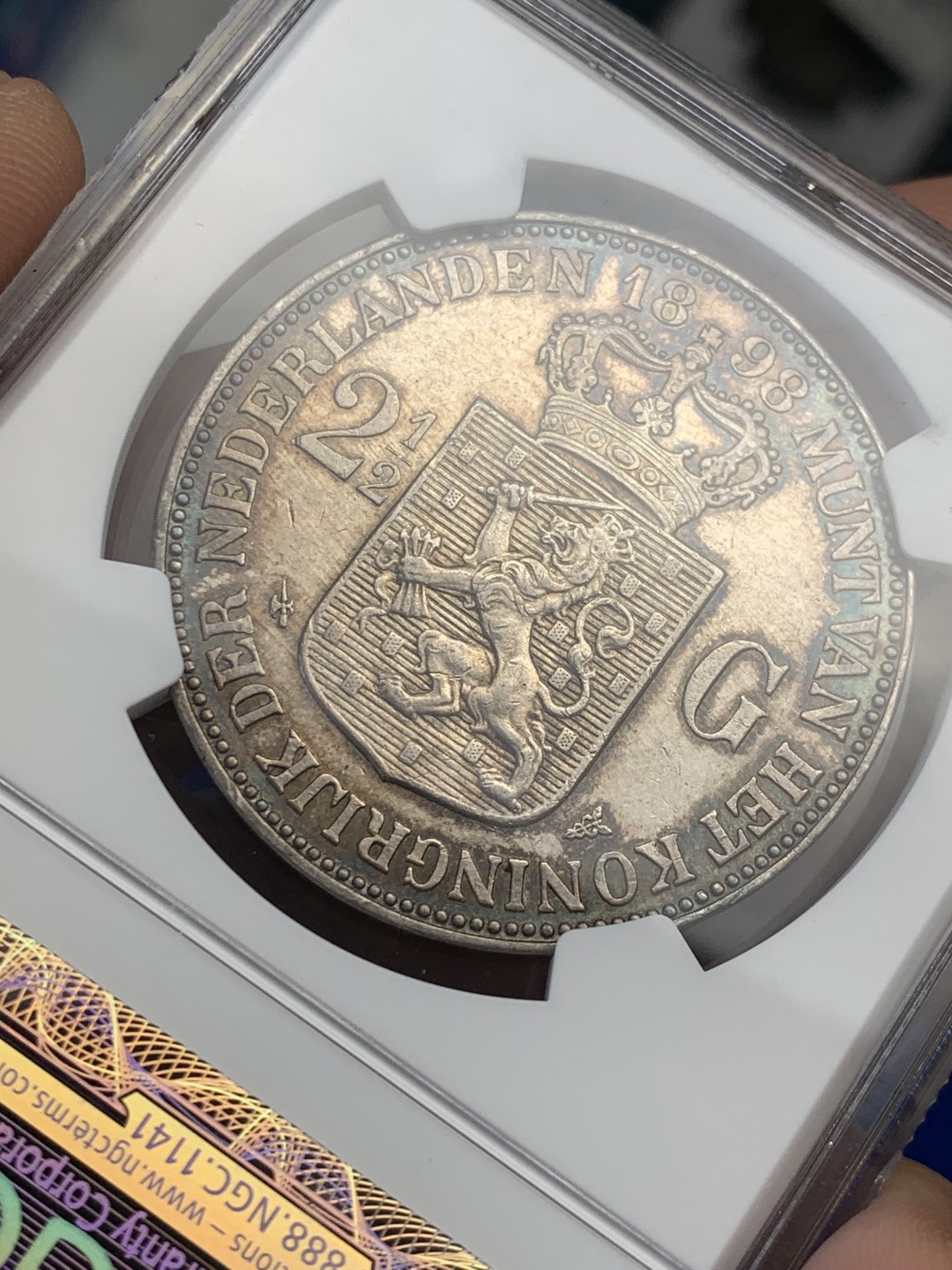 欢迎参加《竞宝斋》五一特拍-第161场-周日，周一 2场 NGC XF45 荷兰1898年威廉明娜女王少女头像2.5盾大银币，单年版