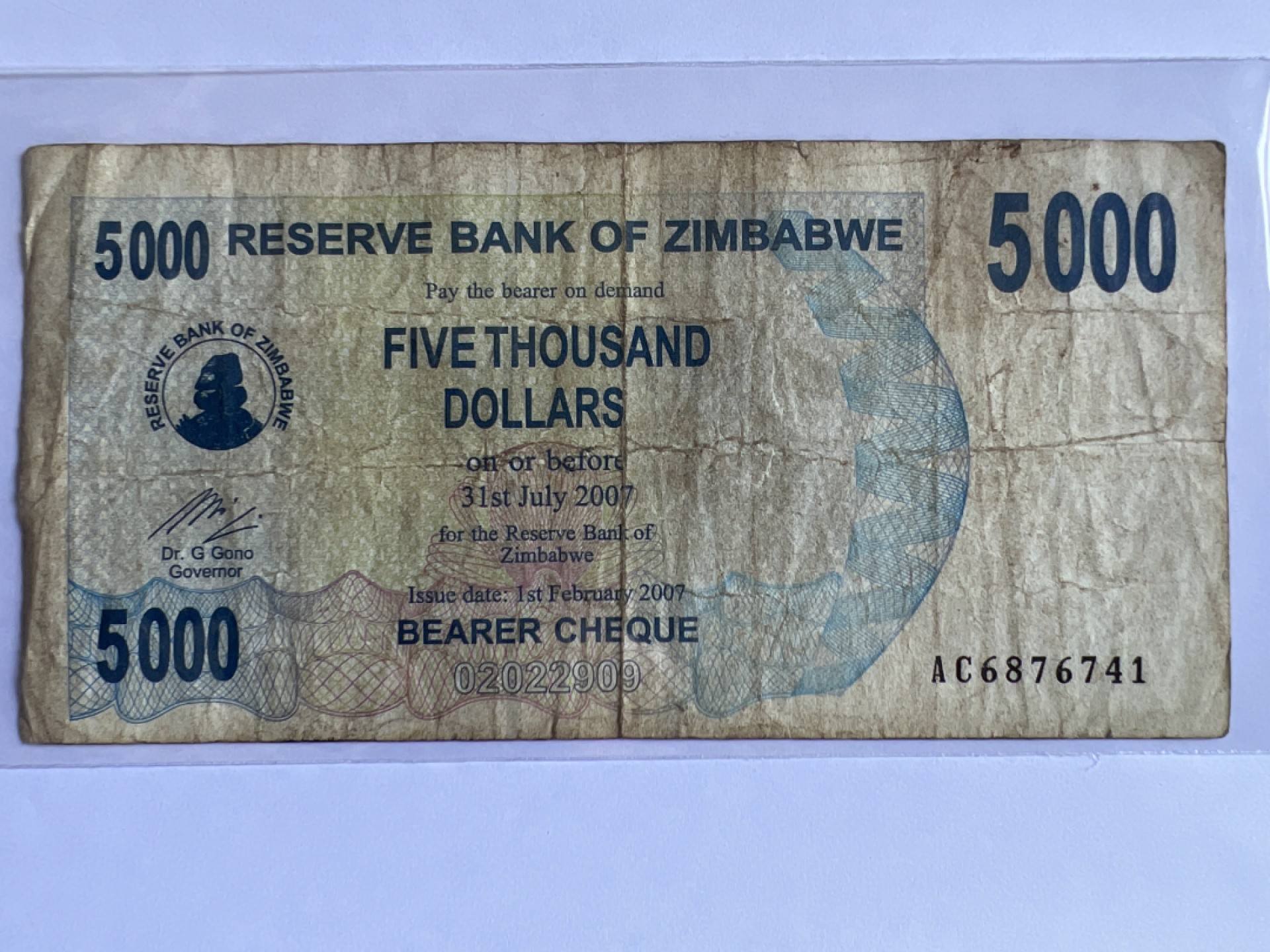 泡泡堂微拍第142幕硬币、纸币捡漏可累计专场👿👿，累计满二十元包邮，接受代拍业务 津巴布韦5000元