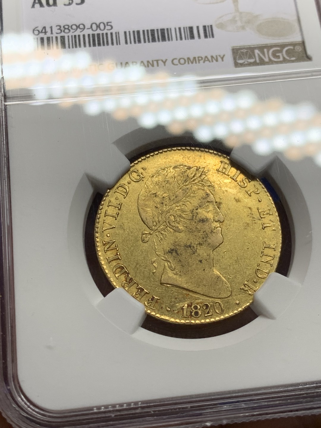 欢迎参加《竞宝斋》五一特拍-第161场-周日，周一 2场 NGC-AU53 西班牙1820年 费尔南多七世 4埃斯库多中元型金币 非常罕见