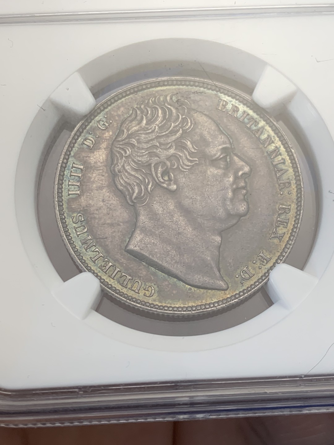 欢迎参加《竞宝斋》五一特拍-第161场-周日，周一 2场 NGC MS63 英国 1834 威廉四世 半克朗银币 极品淡蓝包浆 超级状态