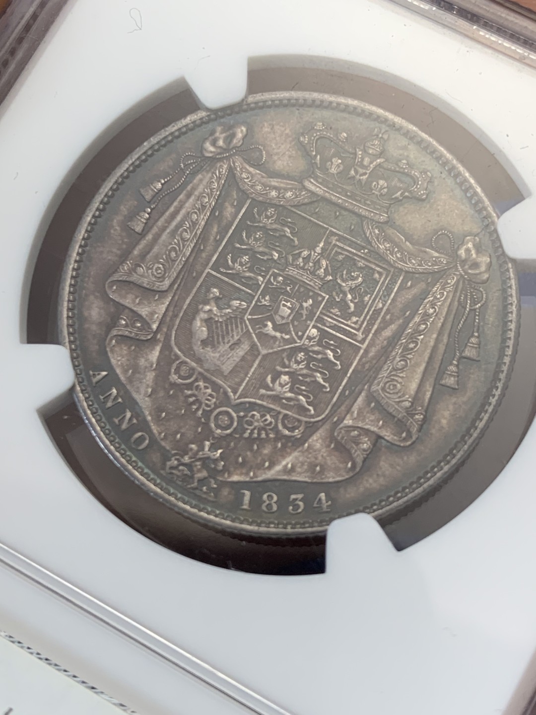 欢迎参加《竞宝斋》五一特拍-第161场-周日，周一 2场 NGC MS63 英国 1834 威廉四世 半克朗银币 极品淡蓝包浆 超级状态