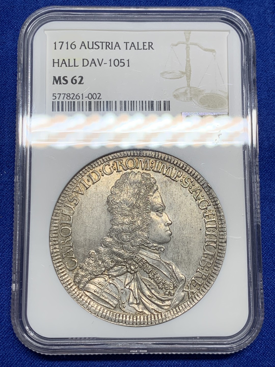 欢迎参加《竞宝斋》五一特拍-第161场-周日，周一 2场 NGC-MS62 神圣罗马帝国 1716年1泰勒银币 卡尔六世少见年轻头像，全币高点和底板没有任何磨损或丝痕，62实属低评