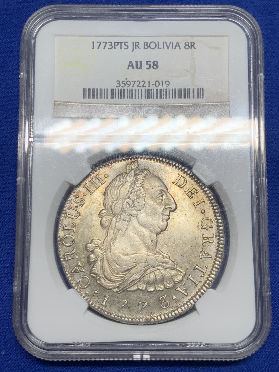 欢迎参加《竞宝斋》五一特拍-第161场-周日，周一 2场 NGC-AU58 玻利维亚 1773年 卡三双柱大银 玻利维亚卡三首年 原味深打 满眼肌肉感 背面PL感十足 收藏级品相