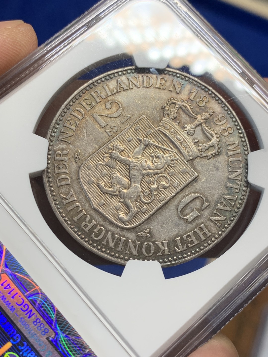 欢迎参加《竞宝斋》五一特拍-第161场-周日，周一 2场 NGC XF45 荷兰1898年威廉明娜女王少女头像2.5盾大银币，单年版