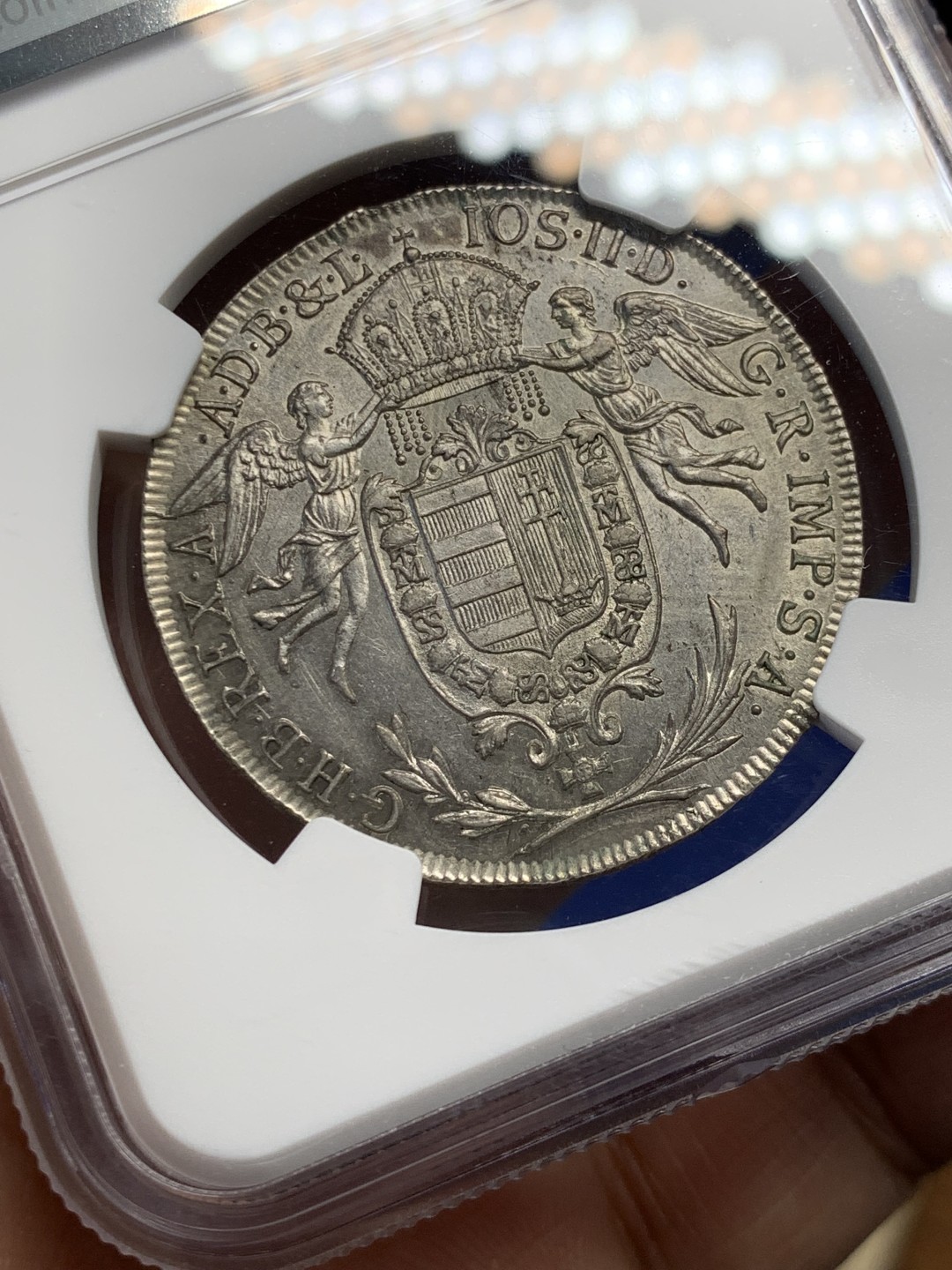 欢迎参加《竞宝斋》五一特拍-第161场-周日，周一 2场 NGC-UNCD 神圣罗马帝国 匈牙利1786年 圣母抱婴1/2泰勒 约瑟夫二世在位时铸造 少见品种，带转光 ngc严评压分了