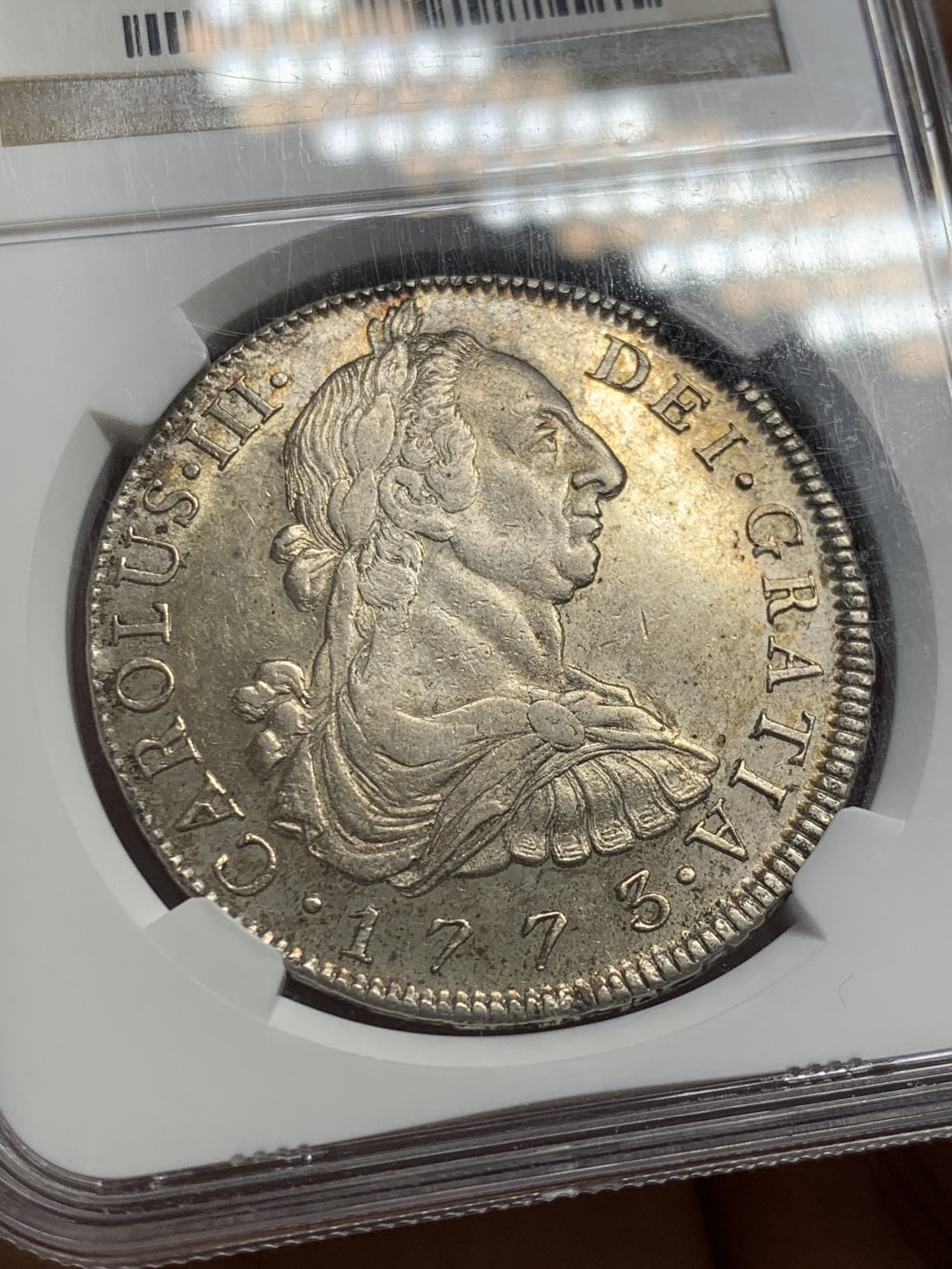 欢迎参加《竞宝斋》五一特拍-第161场-周日，周一 2场 NGC-AU58 玻利维亚 1773年 卡三双柱大银 玻利维亚卡三首年 原味深打 满眼肌肉感 背面PL感十足 收藏级品相