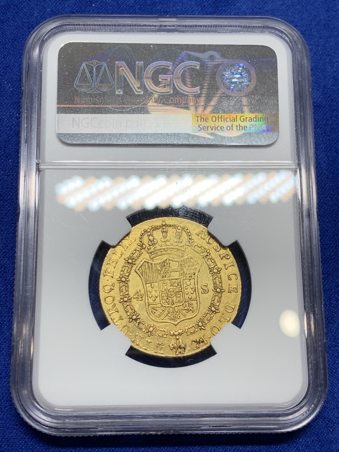 欢迎参加《竞宝斋》五一特拍-第161场-周日，周一 2场 NGC-AU53 西班牙1820年 费尔南多七世 4埃斯库多中元型金币 非常罕见