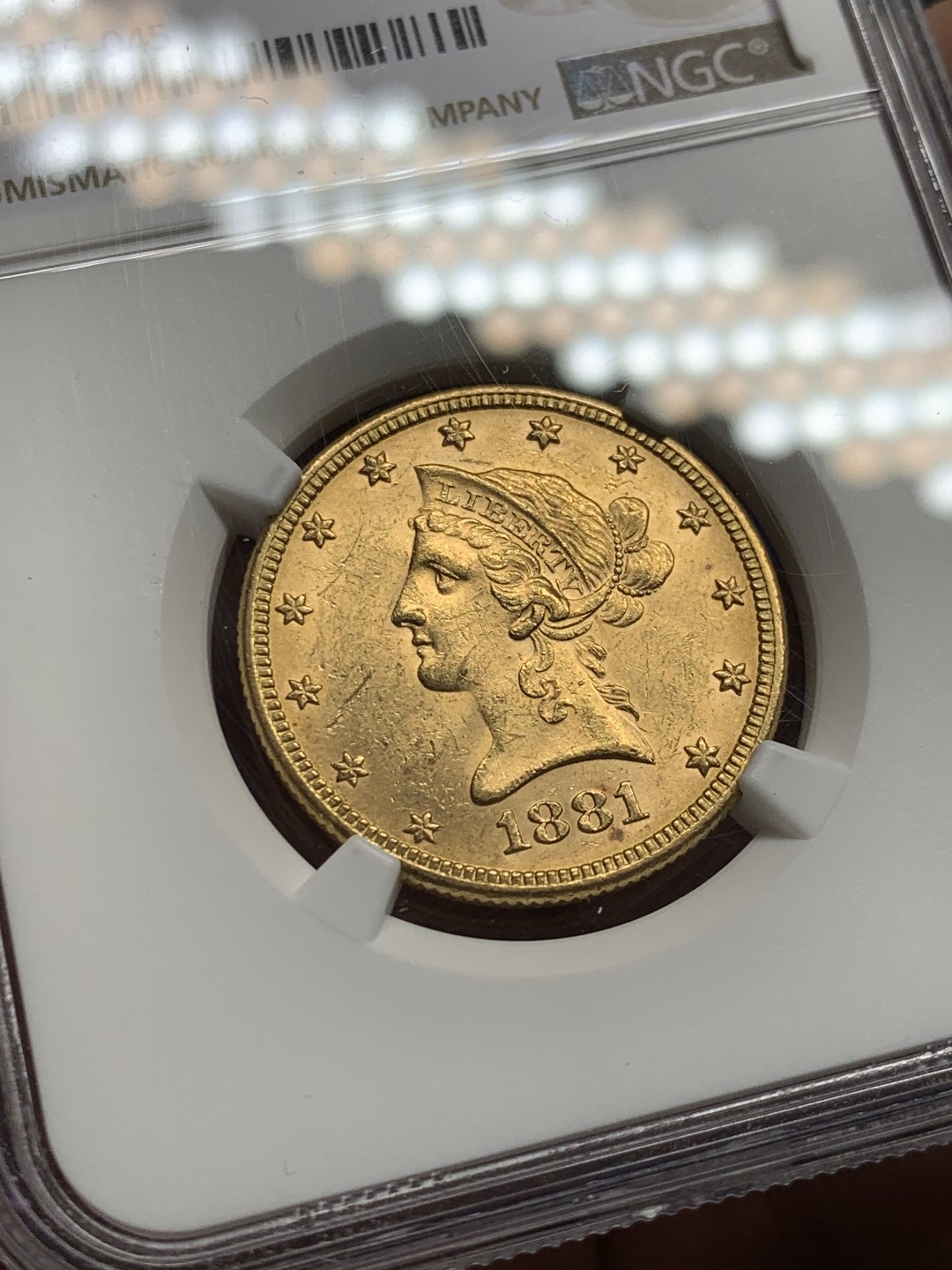 欢迎参加《竞宝斋》五一特拍-第161场-周日，周一 2场 NGC-MS61 美国1881年 自由女神10元金币 算是比较靠前的年份 能上MS的都难得