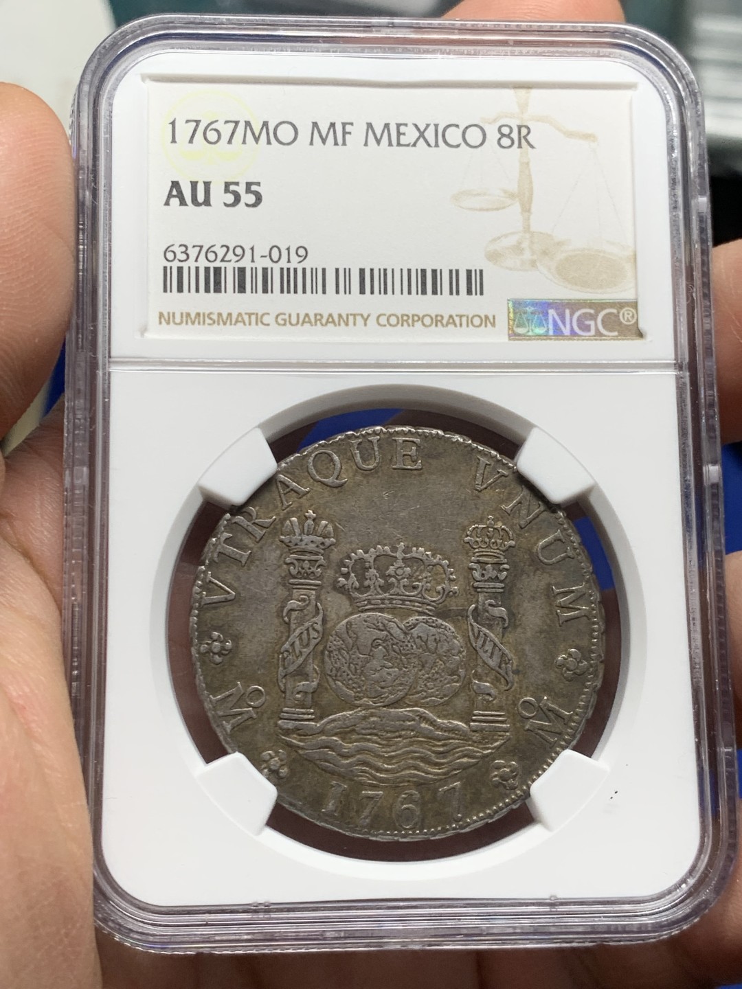 欢迎参加《竞宝斋》五一特拍-第161场-周日，周一 2场 NGC AU55 墨西哥 1767 地球双柱大银币 油腻的浓郁五彩包浆 西属看状态 不可多得