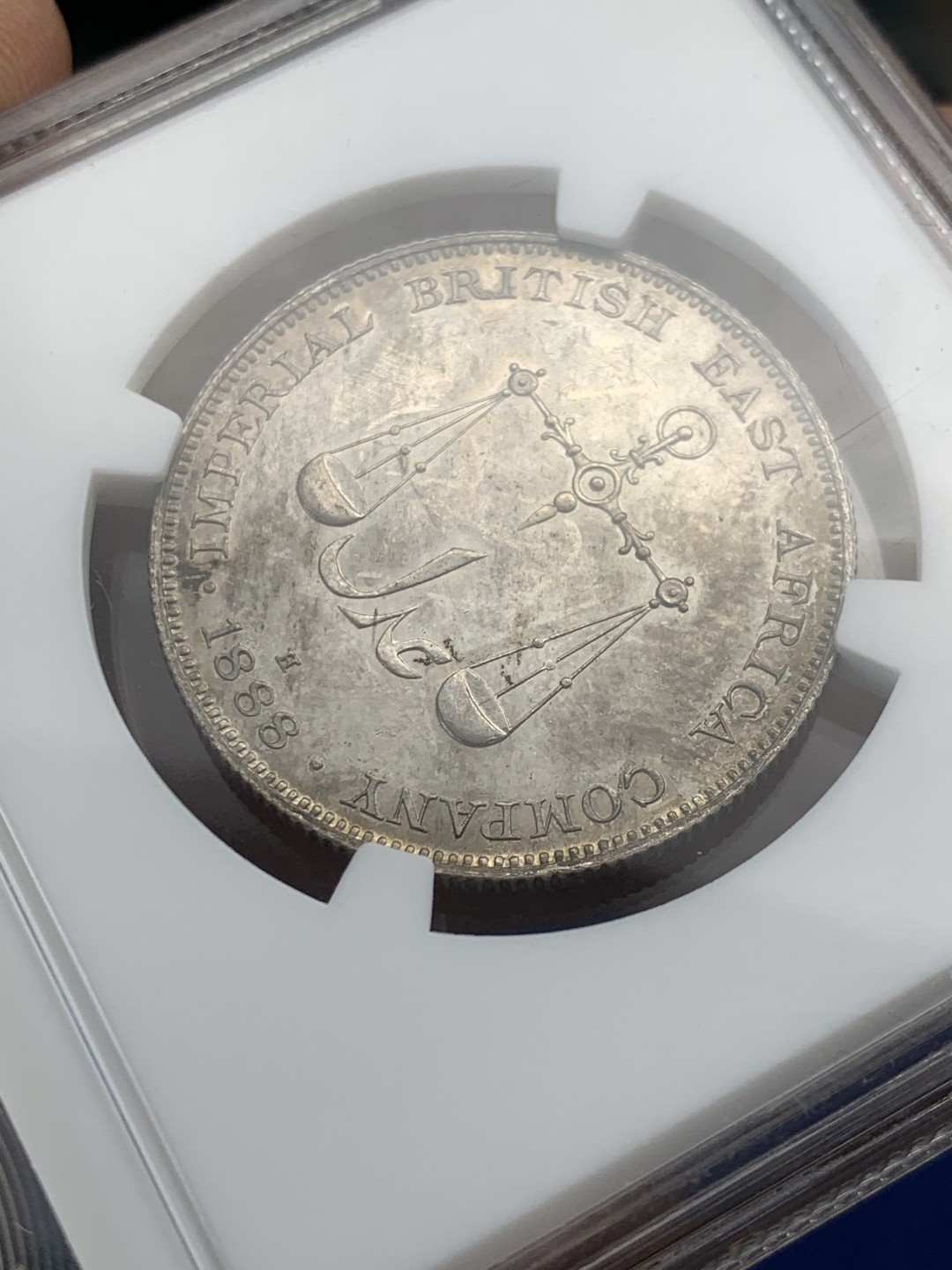 欢迎参加《竞宝斋》五一特拍-第161场-周日，周一 2场 亚军分 NGC MS64 1888 蒙巴萨一卢比 仅有一枚更高分，由大不列颠东非公司发行给东非的殖民贸易钱币