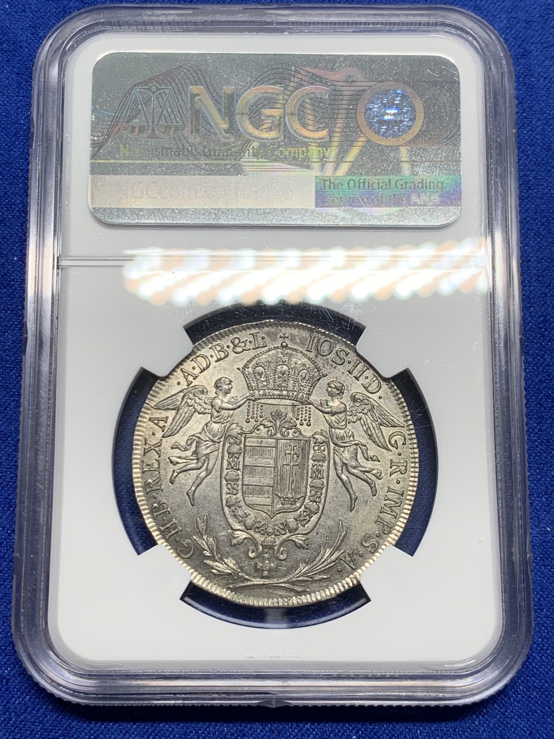 欢迎参加《竞宝斋》五一特拍-第161场-周日，周一 2场 NGC-UNCD 神圣罗马帝国 匈牙利1786年 圣母抱婴1/2泰勒 约瑟夫二世在位时铸造 少见品种，带转光 ngc严评压分了