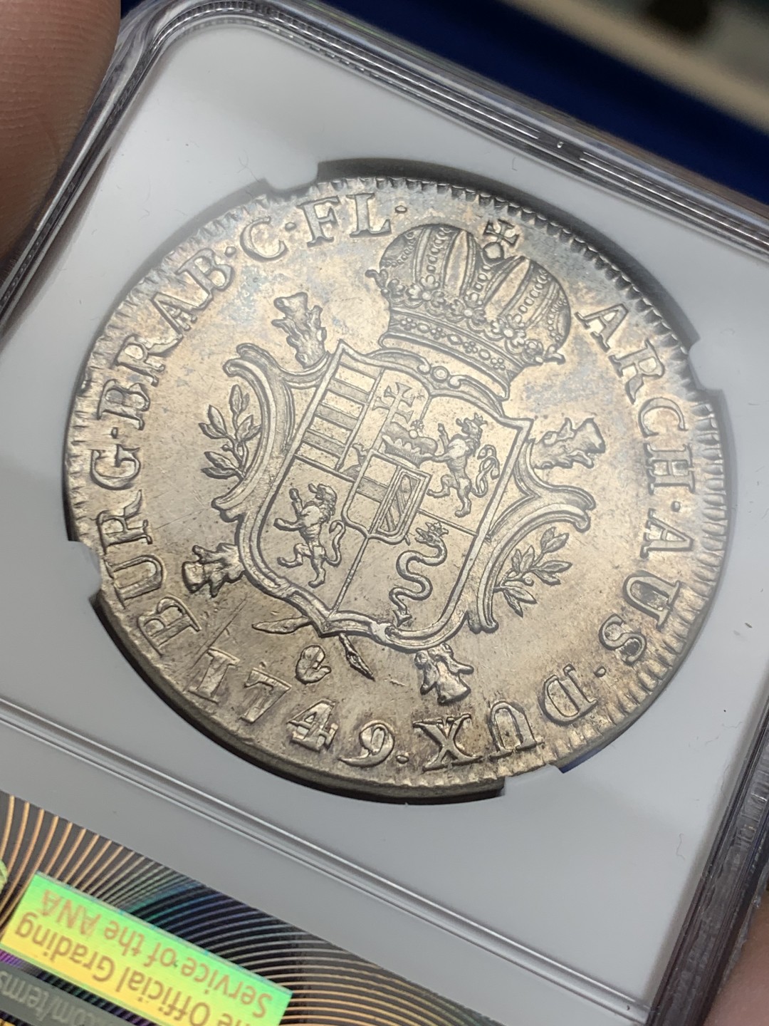 欢迎参加《竞宝斋》五一特拍-第161场-周日，周一 2场 NGC-AU55 1749年奥属尼德兰1杜卡特银币 首年版，33.25克，远超同时期各国主币。非常少见的大奶妈头像版本钱币，唯一季军分