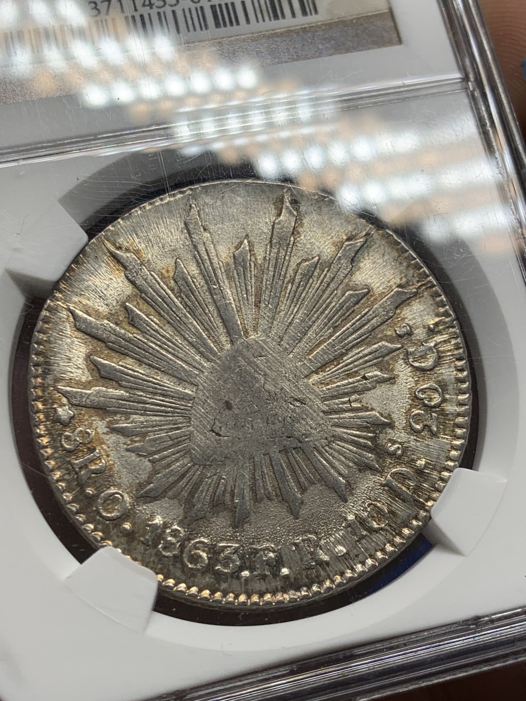 欢迎参加《竞宝斋》五一特拍-第161场-周日，周一 2场 NGC MS63 1863 O FR 墨西哥  早期鹰洋8里亚尔银币，特别粗壮，大名誉品