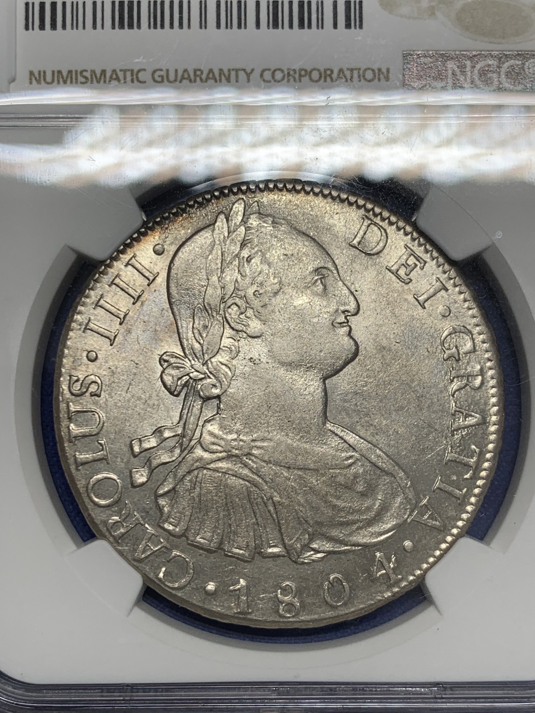 欢迎参加《竞宝斋》五一特拍-第161场-周日，周一 2场 NGC-AU58 西属玻利维亚 1804年卡四8R银币,高点俱全，底板几近无痕，铸纹还在，严重低评的一颗卡四
