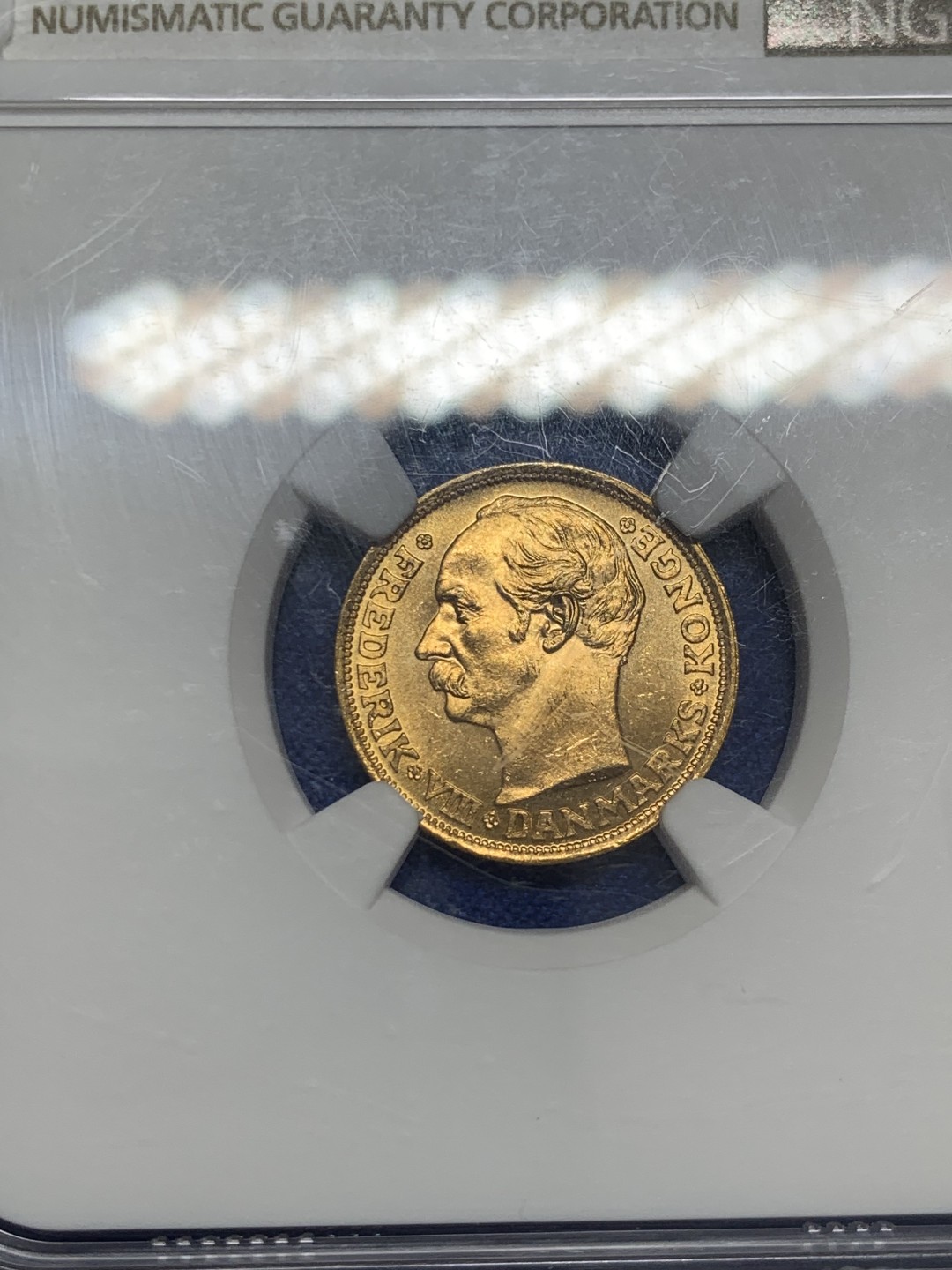 欢迎参加《竞宝斋》五一特拍-第161场-周日，周一 2场 NGC-MS65 1909年 丹麦 10克朗金币 4.48克 900金 收藏级分数 NGC官网60分的价格已经来到300美元了