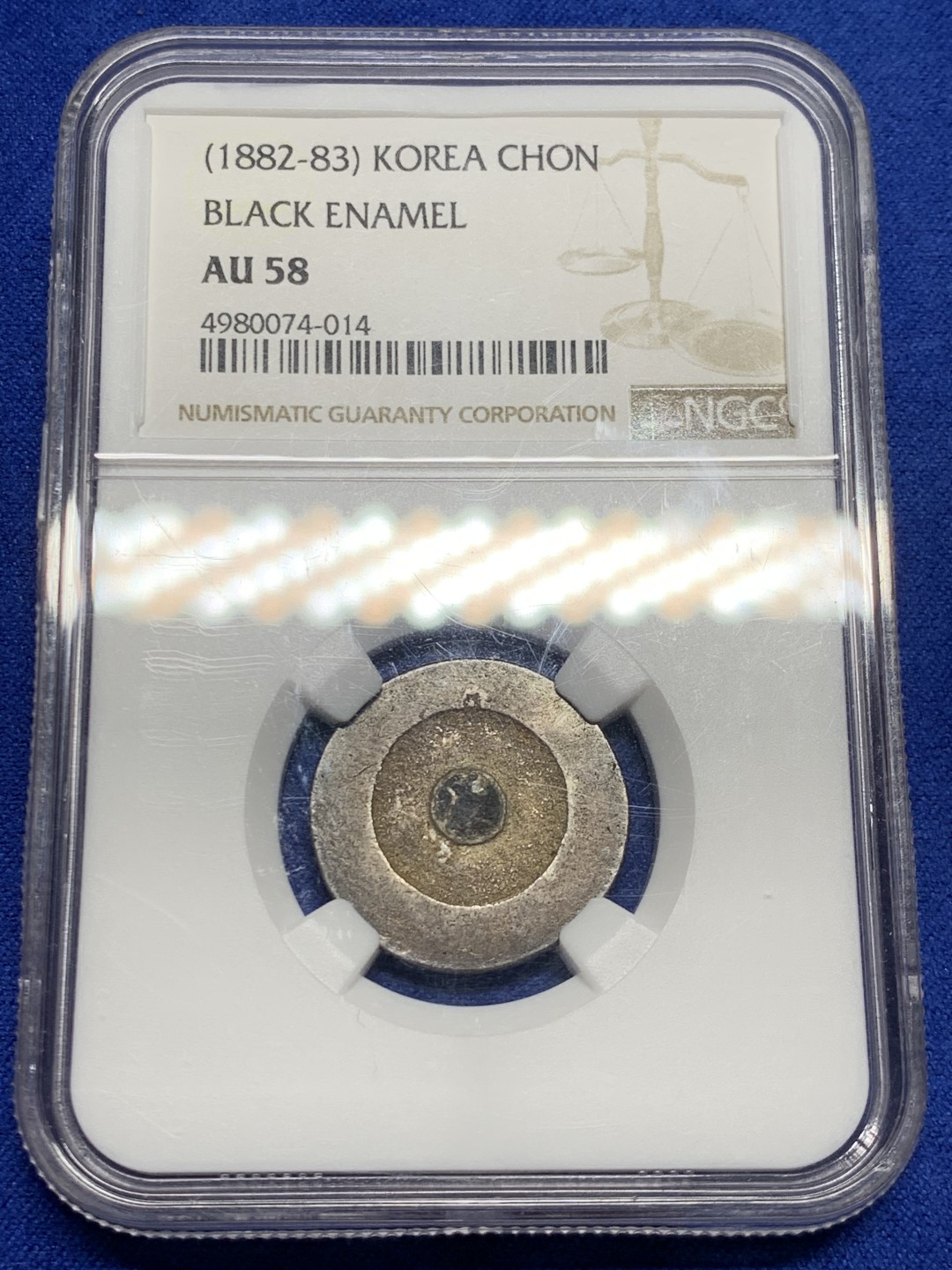 欢迎参加《竞宝斋》五一特拍-第161场-周日，周一 2场 NGC AU58 朝鲜 1882年 朝鲜大东 黑珐琅一钱银币 珐琅不错 原味包浆 AU58高分不易