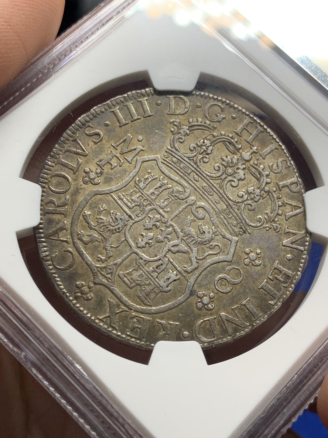 欢迎参加《竞宝斋》五一特拍-第161场-周日，周一 2场 NGC AU55 墨西哥 1767 地球双柱大银币 油腻的浓郁五彩包浆 西属看状态 不可多得