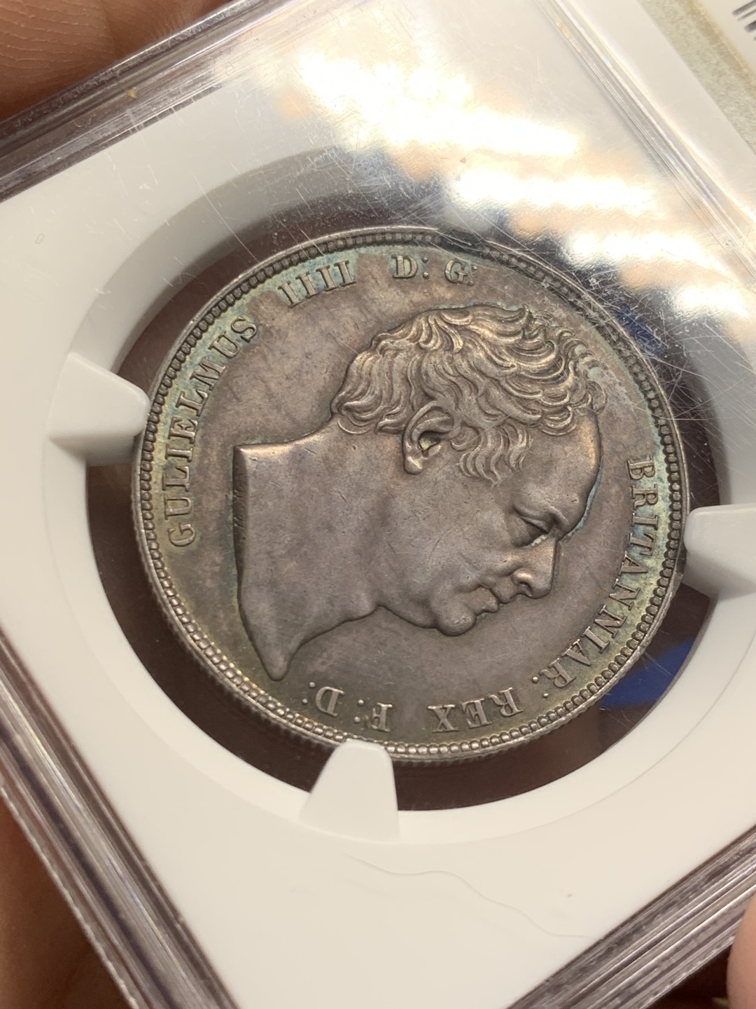 欢迎参加《竞宝斋》五一特拍-第161场-周日，周一 2场 NGC MS63 英国 1834 威廉四世 半克朗银币 极品淡蓝包浆 超级状态