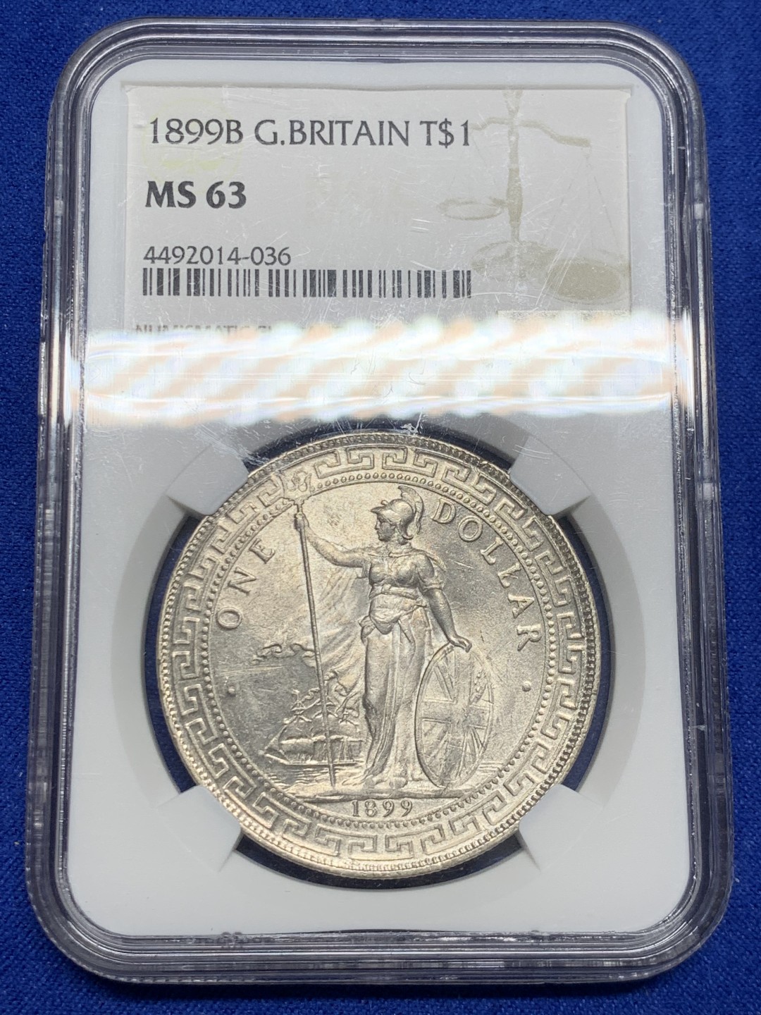 欢迎参加《竞宝斋》五一特拍-第161场-周日，周一 2场 NGC-MS63 英国1899年站洋1元银币，早期年份好品，银霜转光品相