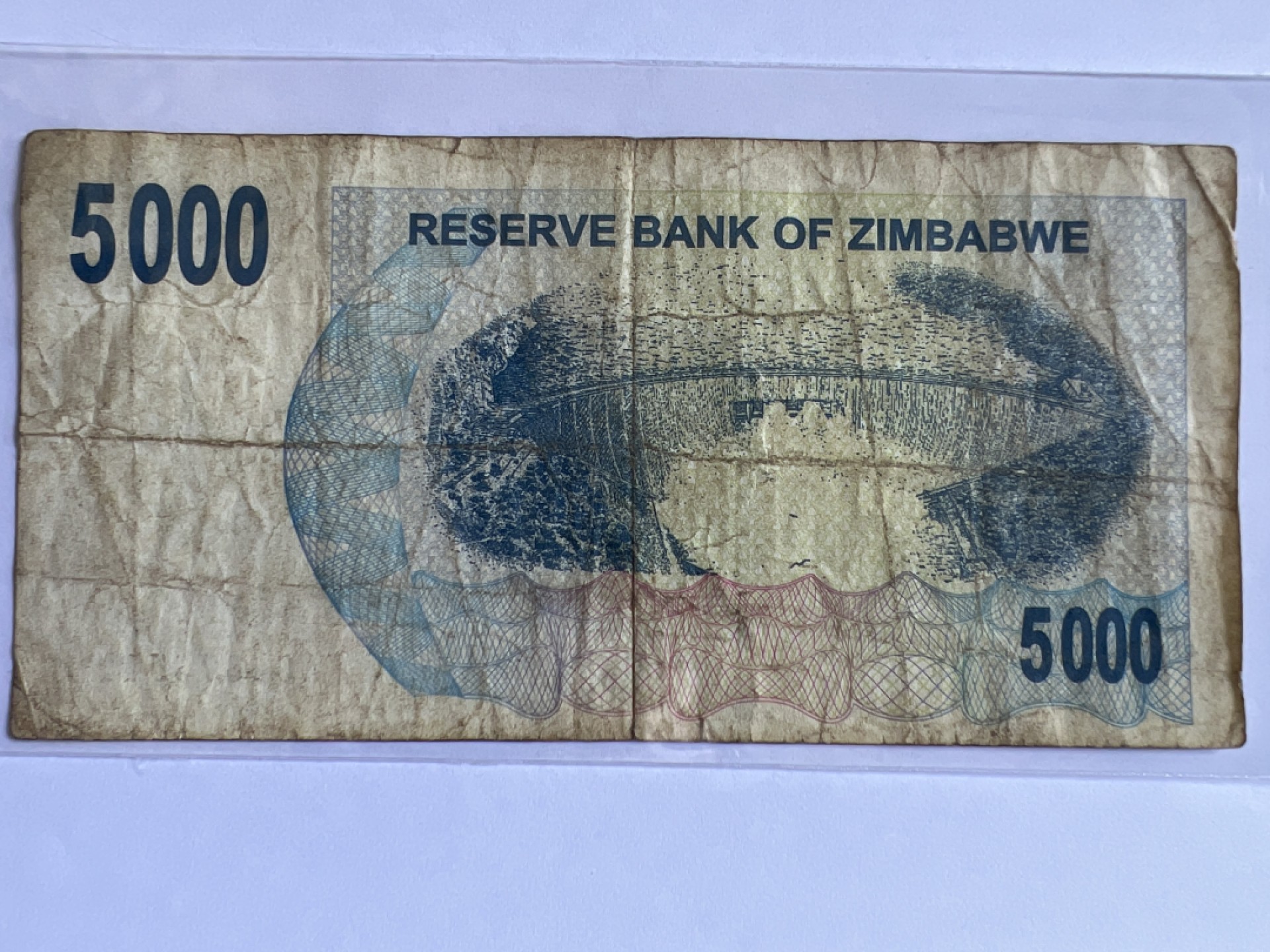 泡泡堂微拍第142幕硬币、纸币捡漏可累计专场👿👿，累计满二十元包邮，接受代拍业务 津巴布韦5000元