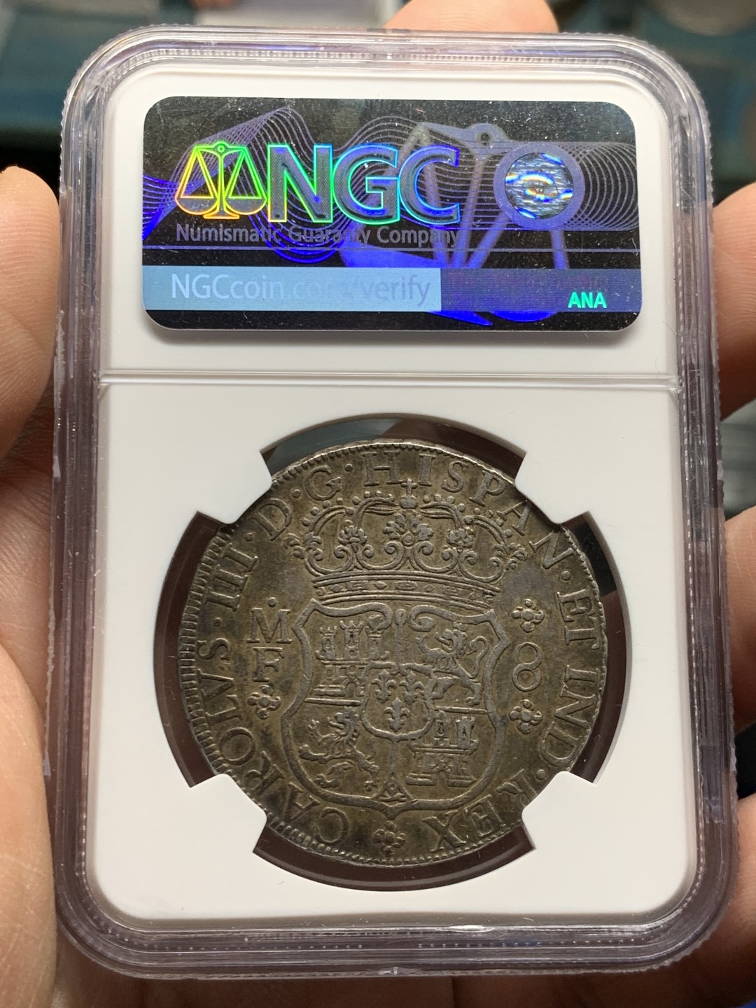 欢迎参加《竞宝斋》五一特拍-第161场-周日，周一 2场 NGC AU55 墨西哥 1767 地球双柱大银币 油腻的浓郁五彩包浆 西属看状态 不可多得