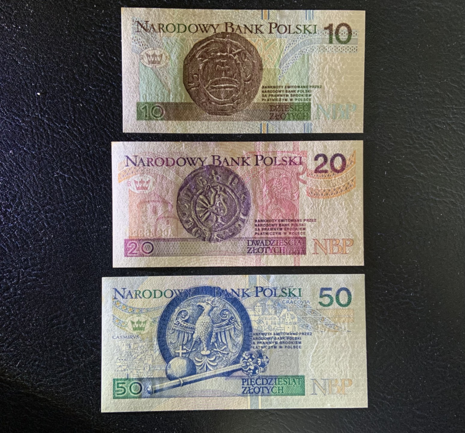 收藏联盟Quantum Auction 第254期拍卖  波兰1994年10-50兹罗提 品相UNC 边角瑕疵 细节如图  初版