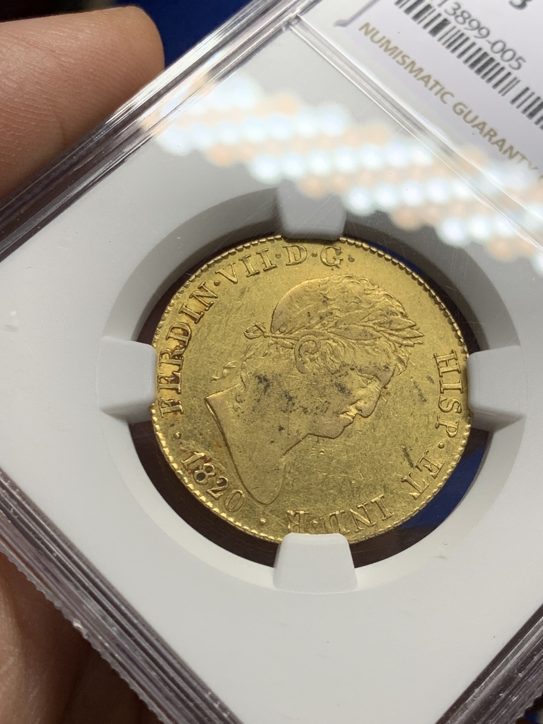 欢迎参加《竞宝斋》五一特拍-第161场-周日，周一 2场 NGC-AU53 西班牙1820年 费尔南多七世 4埃斯库多中元型金币 非常罕见