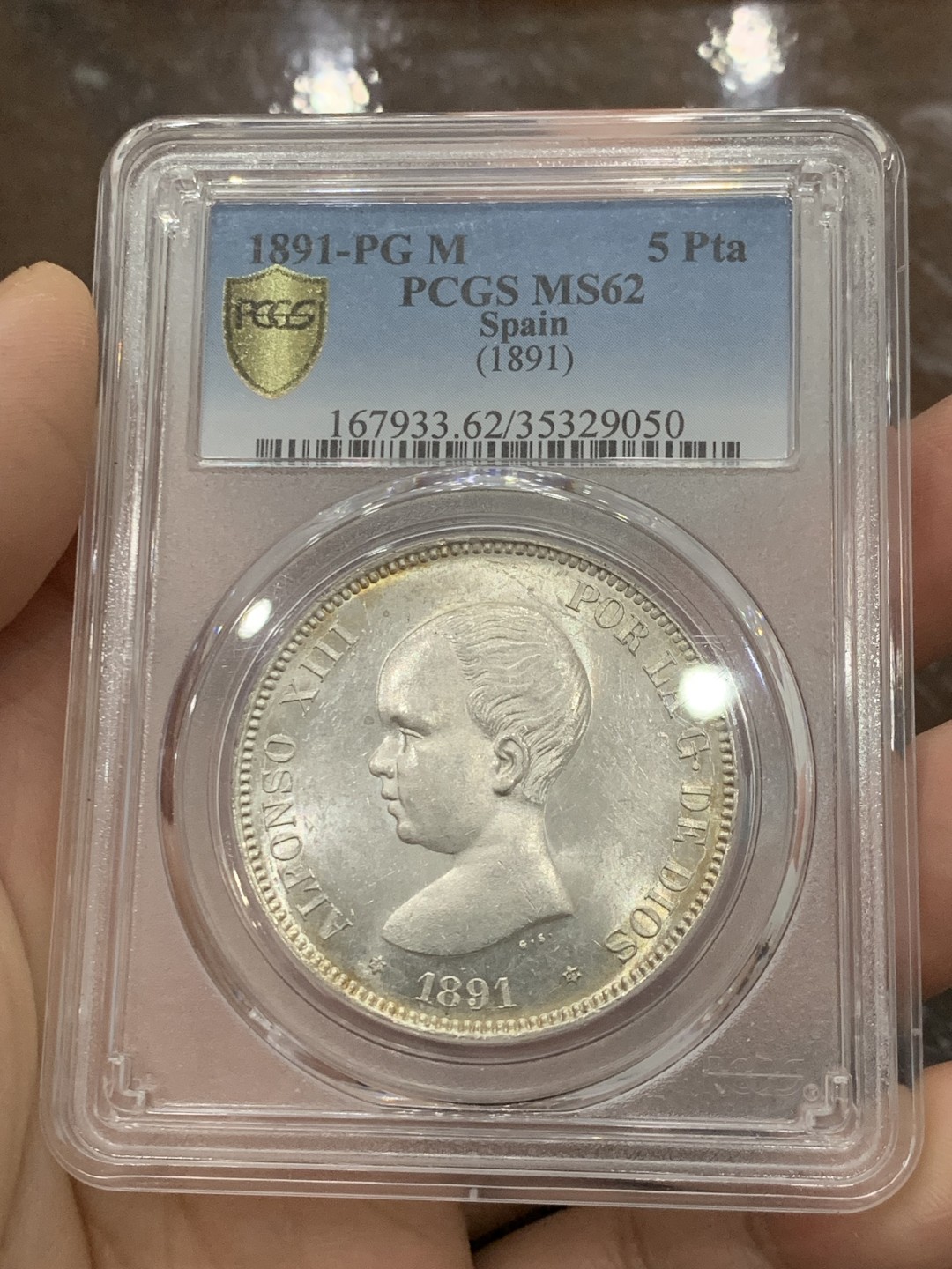 欢迎参加《竞宝斋》五一特拍-第161场-周日，周一 2场 亚军分 PCGS-MS62 西班牙1891年 阿方索十三世光头版 5比塞塔双柱大银币 此版上MS出分的要比其他几个头像少很多