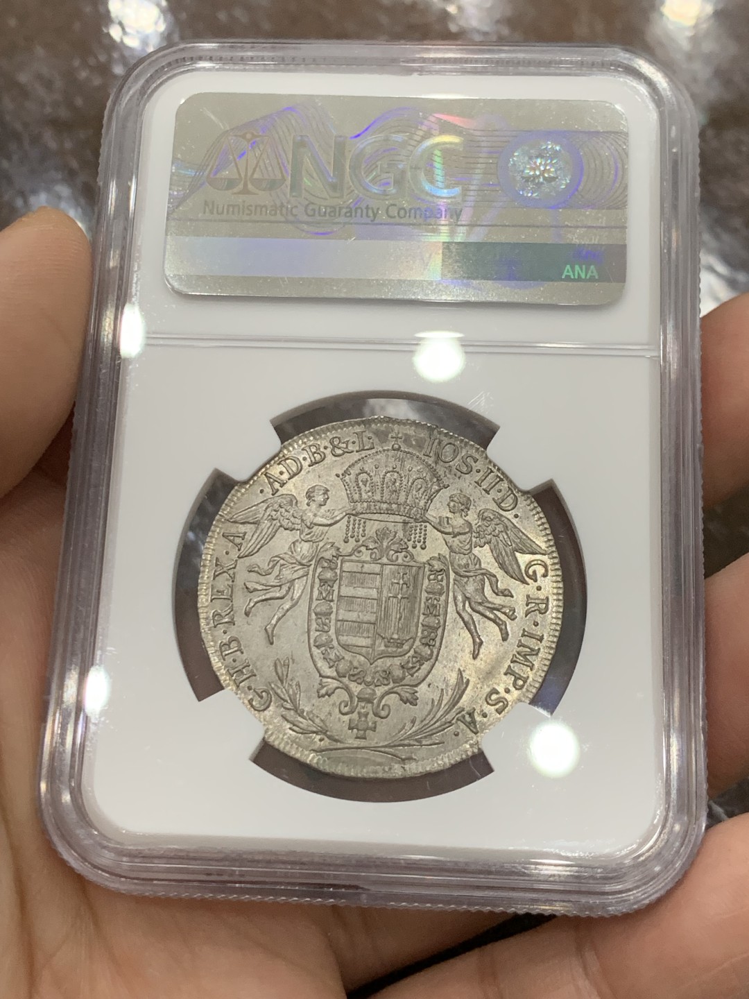 欢迎参加《竞宝斋》五一特拍-第161场-周日，周一 2场 NGC-UNCD 神圣罗马帝国 匈牙利1786年 圣母抱婴1/2泰勒 约瑟夫二世在位时铸造 少见品种，带转光 ngc严评压分了