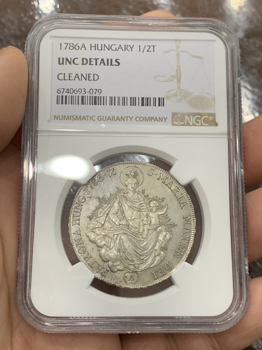 欢迎参加《竞宝斋》五一特拍-第161场-周日，周一 2场 NGC-UNCD 神圣罗马帝国 匈牙利1786年 圣母抱婴1/2泰勒 约瑟夫二世在位时铸造 少见品种，带转光 ngc严评压分了