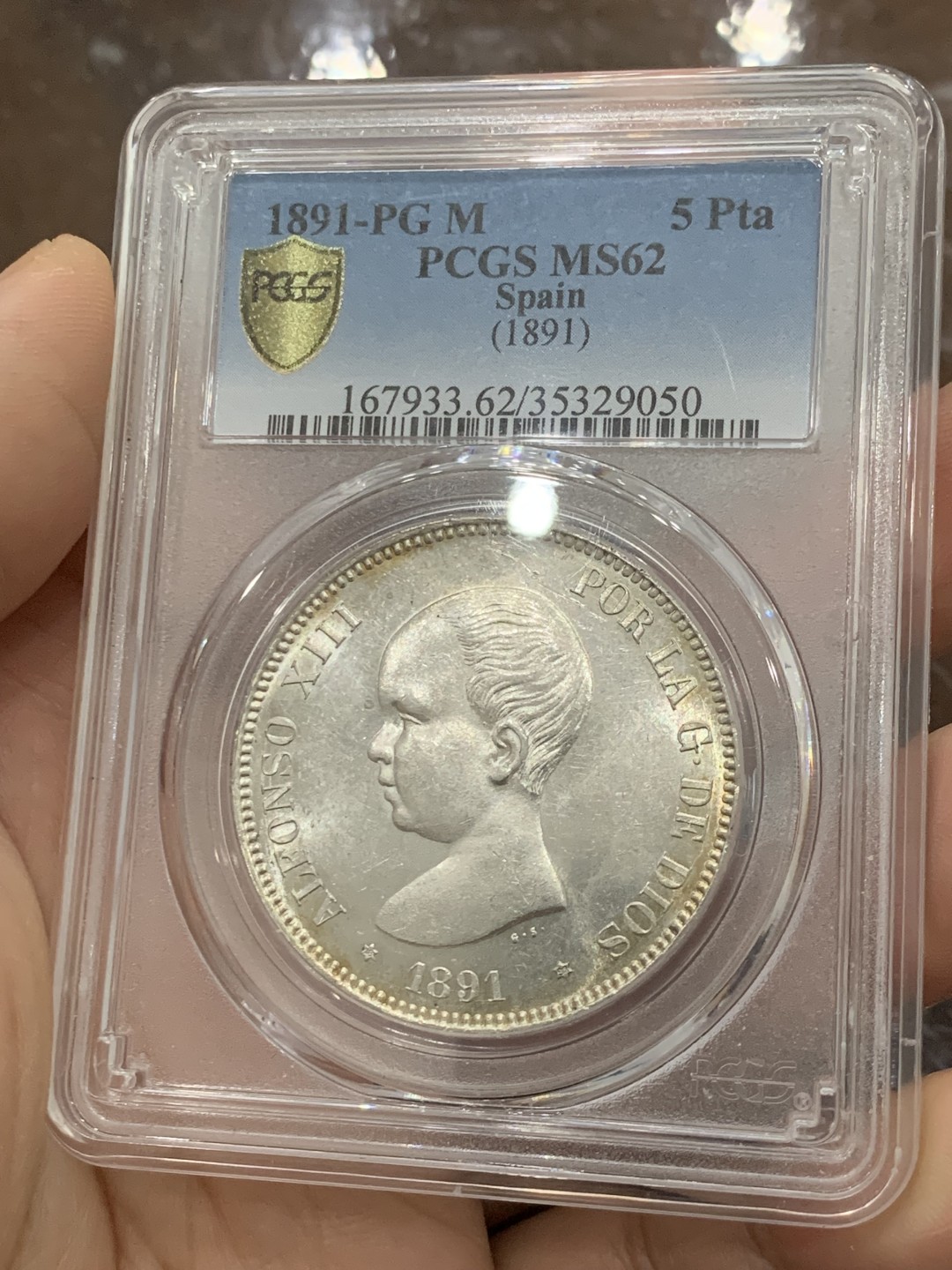 欢迎参加《竞宝斋》五一特拍-第161场-周日，周一 2场 亚军分 PCGS-MS62 西班牙1891年 阿方索十三世光头版 5比塞塔双柱大银币 此版上MS出分的要比其他几个头像少很多