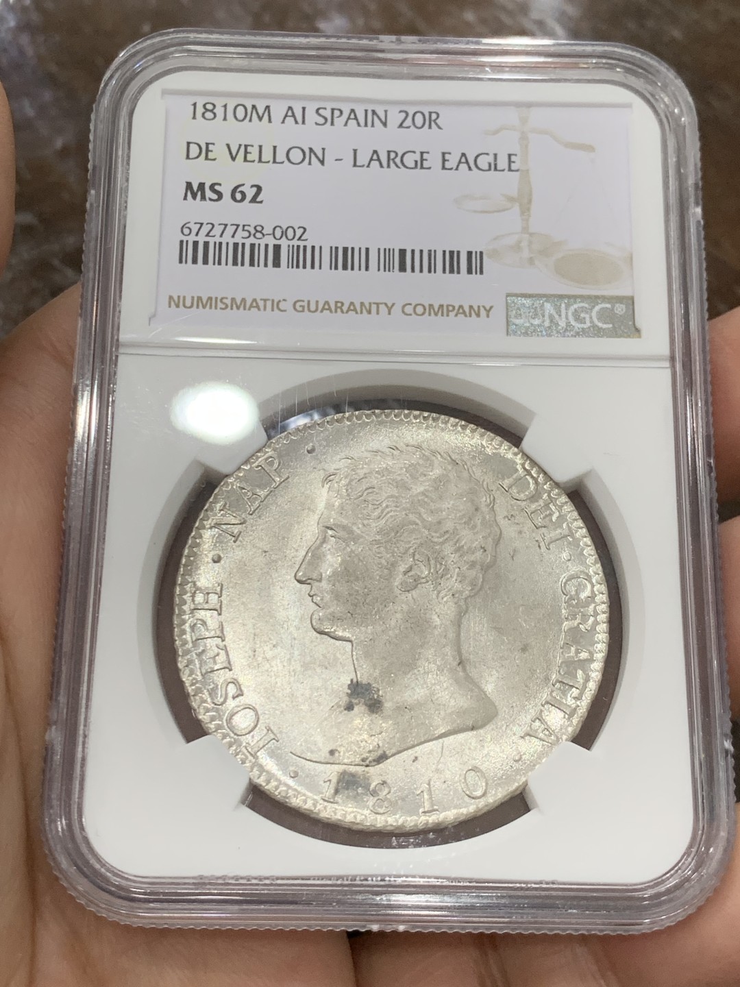 欢迎参加《竞宝斋》五一特拍-第161场-周日，周一 2场 NGC MS62 1810年 法占西班牙 约瑟夫拿破仑20R银币，细节极佳 发丝清晰 光感十足 可以毕业了