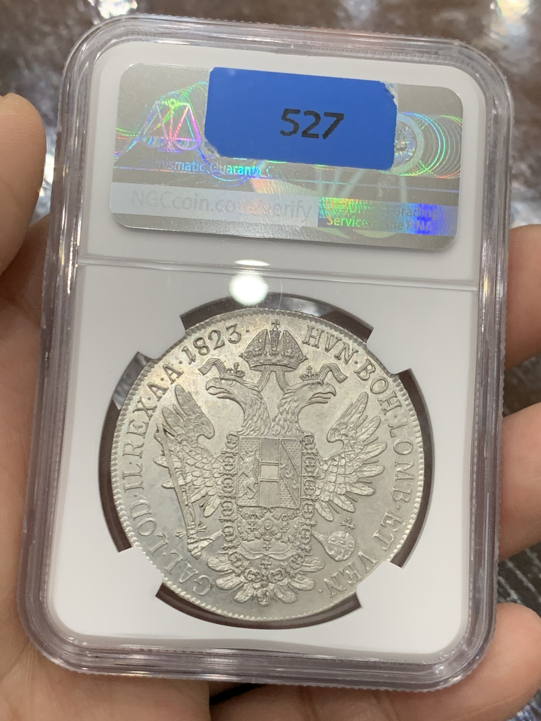 欢迎参加《竞宝斋》五一特拍-第161场-周日，周一 2场 NGC-MS62 奥地利帝国 1823-C 弗朗茨一世泰勒 N/P唯一冠军分 鹰面浮雕细腻 底板完好 收藏级高分