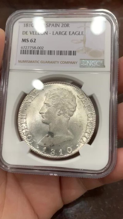 欢迎参加《竞宝斋》五一特拍-第161场-周日，周一 2场 NGC MS62 1810年 法占西班牙 约瑟夫拿破仑20R银币，细节极佳 发丝清晰 光感十足 可以毕业了