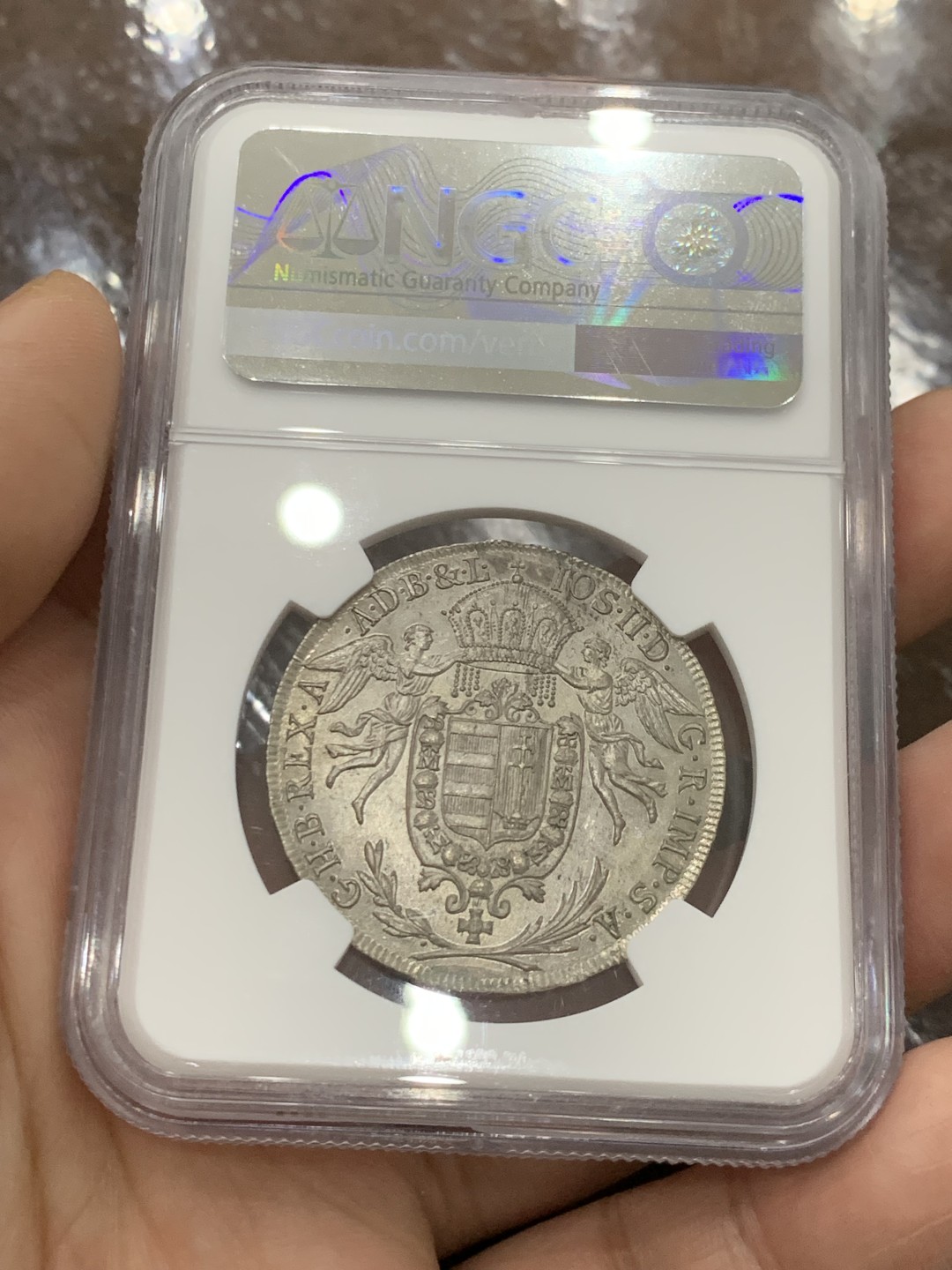 欢迎参加《竞宝斋》五一特拍-第161场-周日，周一 2场 NGC-UNCD 神圣罗马帝国 匈牙利1786年 圣母抱婴1/2泰勒 约瑟夫二世在位时铸造 少见品种，带转光 ngc严评压分了