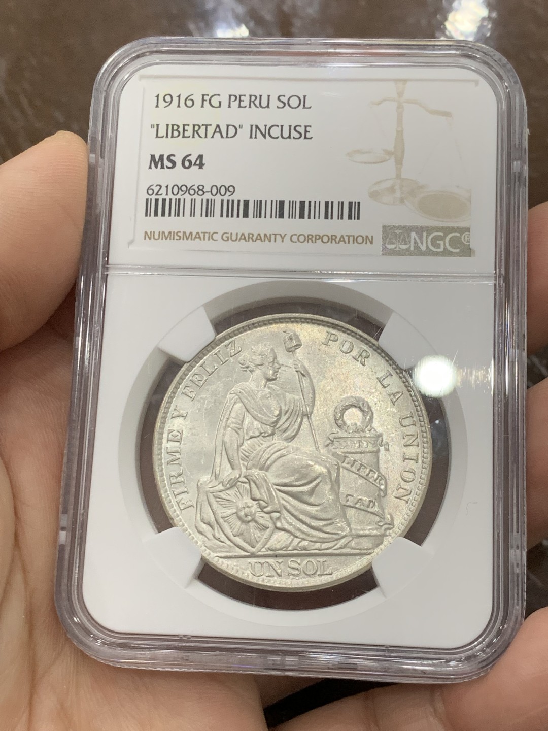 欢迎参加《竞宝斋》五一特拍-第161场-周日，周一 2场 NGC MS64 秘鲁 1916年 1索尔 坐人女神 热门南美银币 季军分 完美状态