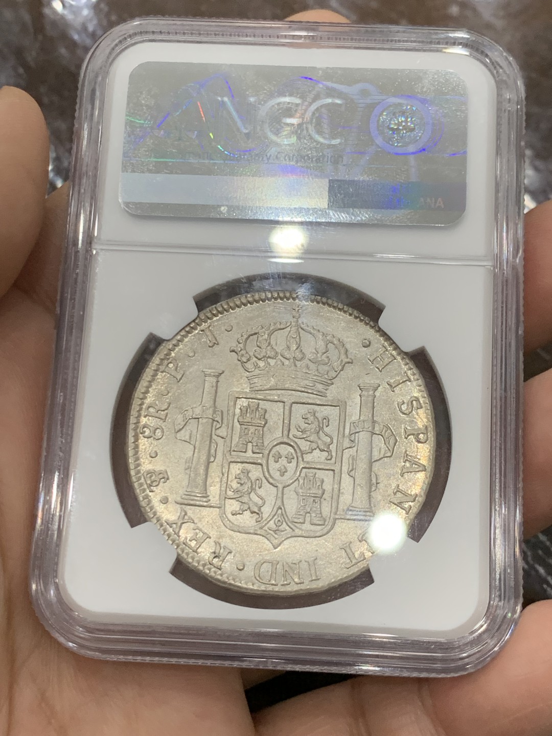 欢迎参加《竞宝斋》五一特拍-第161场-周日，周一 2场 NGC-AU58 西属玻利维亚 1804年卡四8R银币,高点俱全，底板几近无痕，铸纹还在，严重低评的一颗卡四