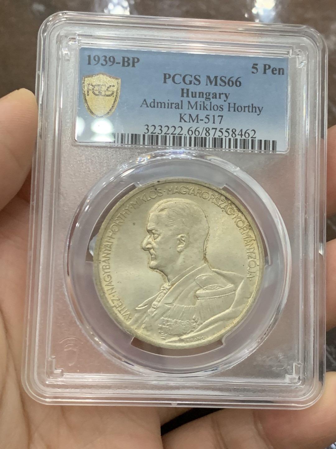欢迎参加《竞宝斋》五一特拍-第161场-周日，周一 2场 PCGS-MS66 匈牙利王国1939年 5潘果 正面人物为匈牙利摄政王霍尔蒂 背面为两天使盾徽 打制清楚 黄油包浆 温润如玉 此为布达佩斯原厂初铸 亚军分 比它高的只有一枚 完美收藏