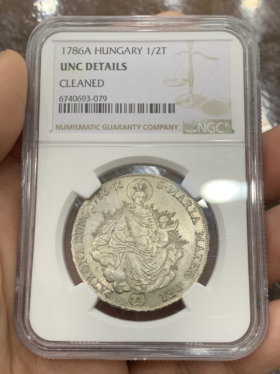 欢迎参加《竞宝斋》五一特拍-第161场-周日，周一 2场 NGC-UNCD 神圣罗马帝国 匈牙利1786年 圣母抱婴1/2泰勒 约瑟夫二世在位时铸造 少见品种，带转光 ngc严评压分了