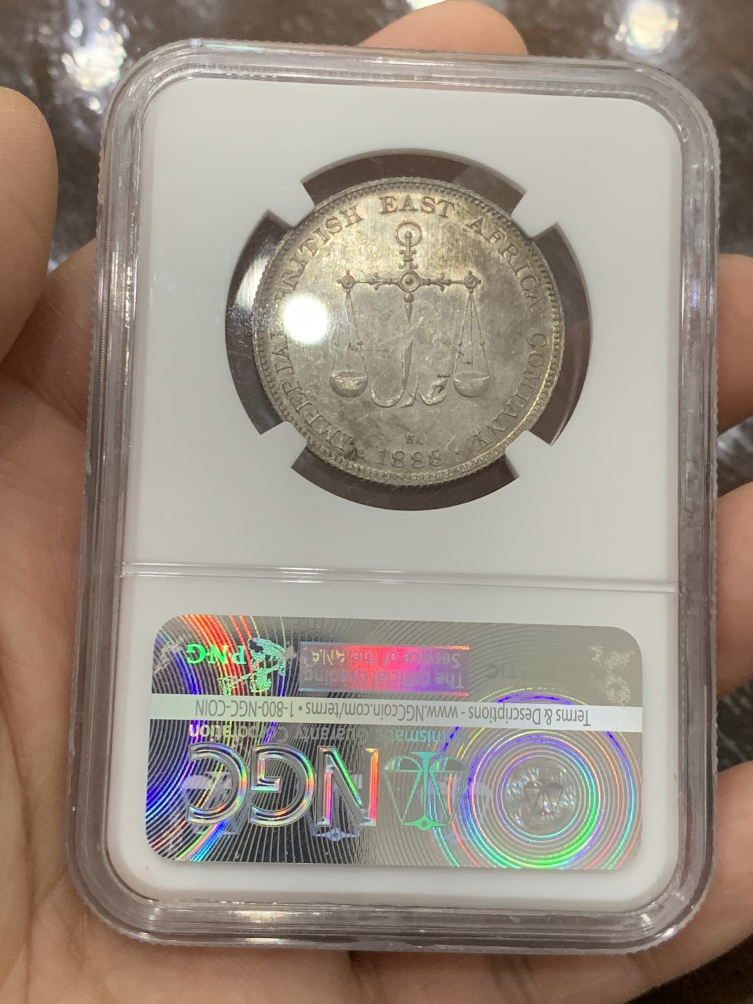 欢迎参加《竞宝斋》五一特拍-第161场-周日，周一 2场 亚军分 NGC MS64 1888 蒙巴萨一卢比 仅有一枚更高分，由大不列颠东非公司发行给东非的殖民贸易钱币