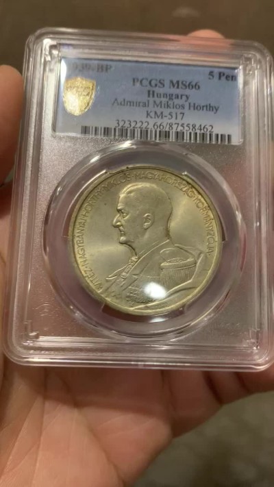 欢迎参加《竞宝斋》五一特拍-第161场-周日，周一 2场 PCGS-MS66 匈牙利王国1939年 5潘果 正面人物为匈牙利摄政王霍尔蒂 背面为两天使盾徽 打制清楚 黄油包浆 温润如玉 此为布达佩斯原厂初铸 亚军分 比它高的只有一枚 完美收藏